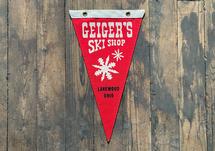Geiger's X Wild Northland Ski Shop Pennant RED